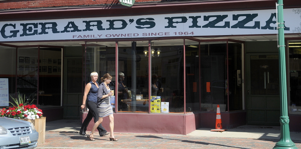 Gerard’s Pizza reopened Monday at the restaurant’s Water Street location in Gardiner after closing because of a fire in neighboring buildings on July 16.