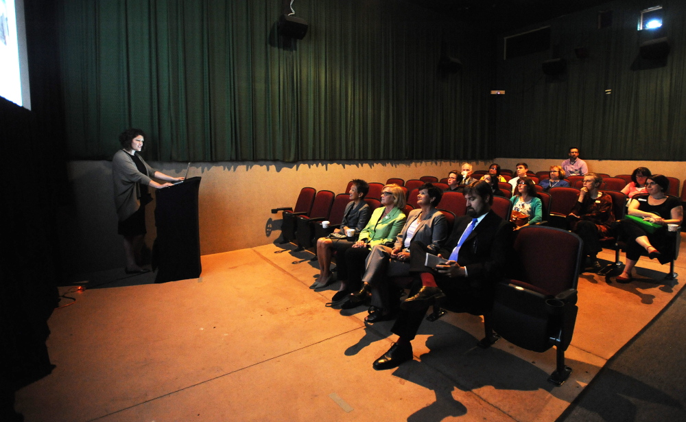 Jane Chu, chairman of the National Endowment of the Arts, left, sits with Rep. Chellie Pingree, left center, Julie Richards, executive director of the Maine Arts Commission, right center, and Nate Rudy, executive director of Waterville Creates!, during a presentation by Shannon Haines, executive director of the Maine Film Center and executive director of the Maine International Film Festival, at Railroad Square cinemas in Waterville on Tuesday.