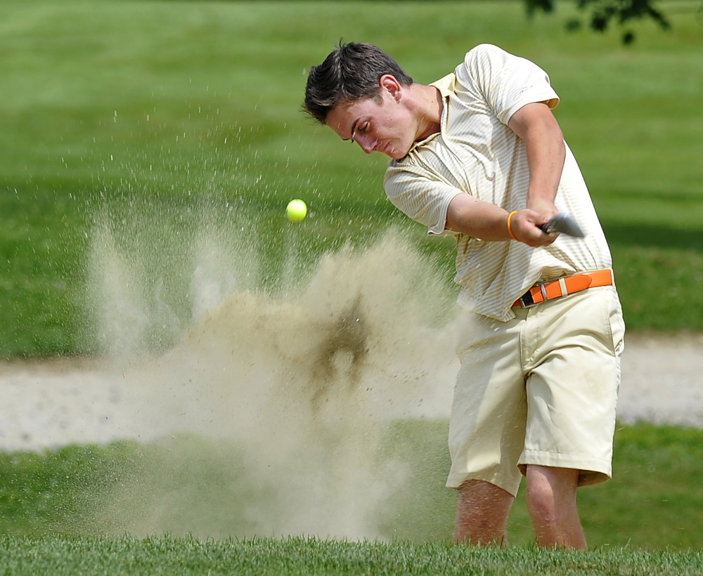 Portland Press Herald file photo by Gordon Chibroski 
 In this August 6, 2014 photo, Luke Ruffing, of Manchester, blasts out of the green-side bunker on the 18th hole of the Maine Junior Amateur Golf Championship at Val Halla Golf and Recreation in Cumberland Center.