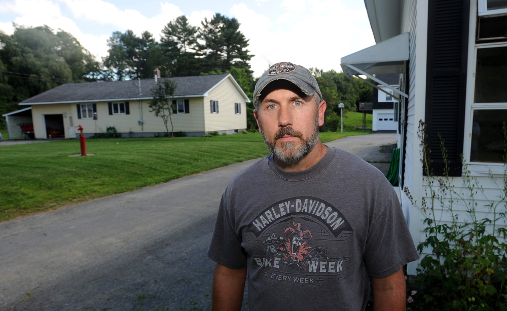 Eric Cyr, who owns a home adjacent to the site of the proposed cellphone tower, is concerned about the health effects of radio frequency radiation.