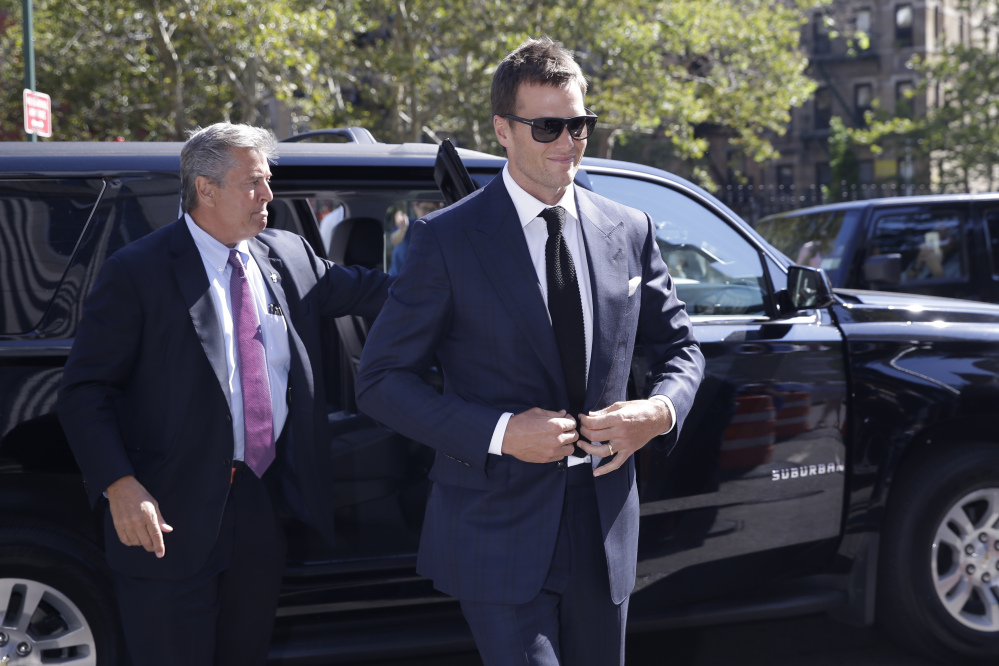 New England Patriots quarterback Tom Brady arrives at federal court Wednesday in New York. Brady and NFL Commissioner Roger Goodell are set to explain to a judge why a controversy over underinflated footballs at last season’s AFC conference championship game is spilling into a new season.