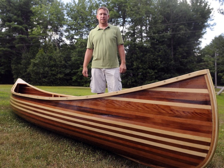 Math teacher Jeromy Jamison worked with Hall-Dale middle and high school students on a cedar-strip canoe to help them learn to apply their math skills.