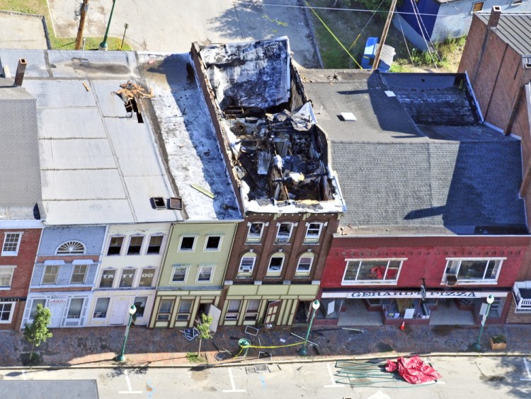 This aerial photo shows the scene on the morning after the July 16 fire in downtown Gardiner.