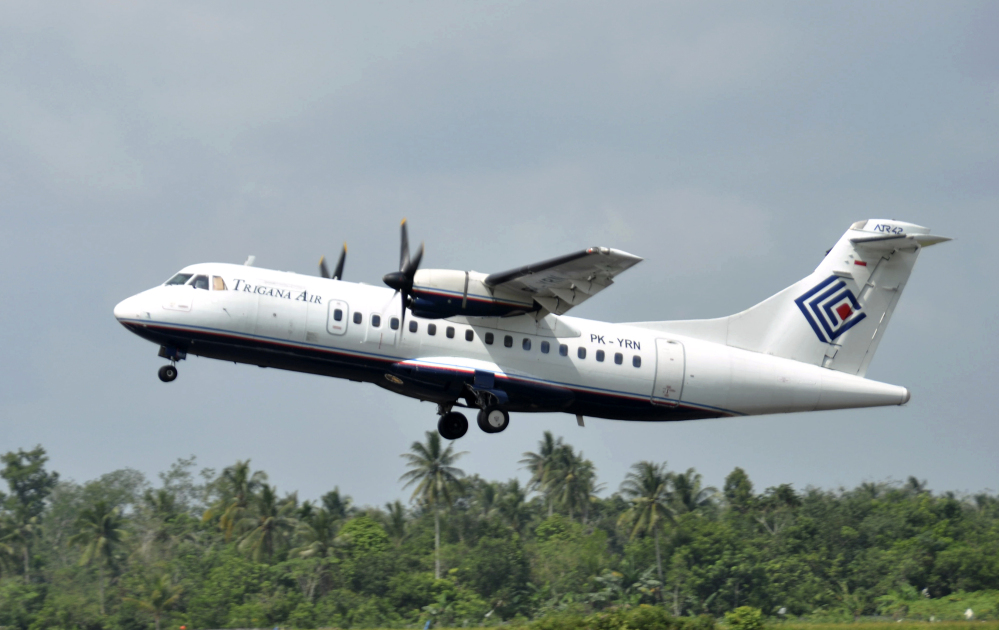 In this photo taken Dec. 26, 2010, Trigana Air Service’s ATR42-300 twin turboprop plane takes off at Supadio airport in Pontianak, West Kalimantan, Indonesia.