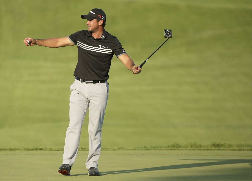 Jason Day celebrates after winning the PGA Championship on Sunday at Whistling Straits in Haven, Wis.