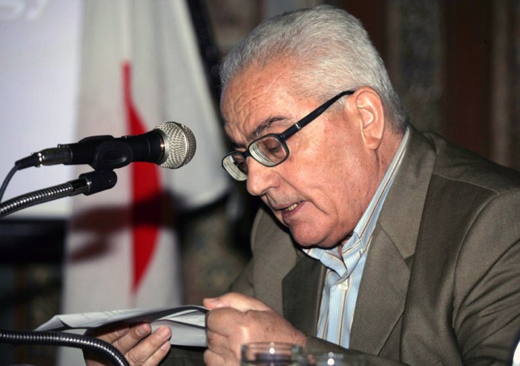 In this undated photo released Tuesday by the Syrian official news agency SANA, one of  Syria’s most prominent antiquities scholars, Khaled al-Asaad, speaks in Syria. Islamic State militants beheaded al-Asaad in the ancient town of Palmyra, Syria, then strapped his body to one of the town’s Roman columns, Syrian state media and an activist group said Wednesday.