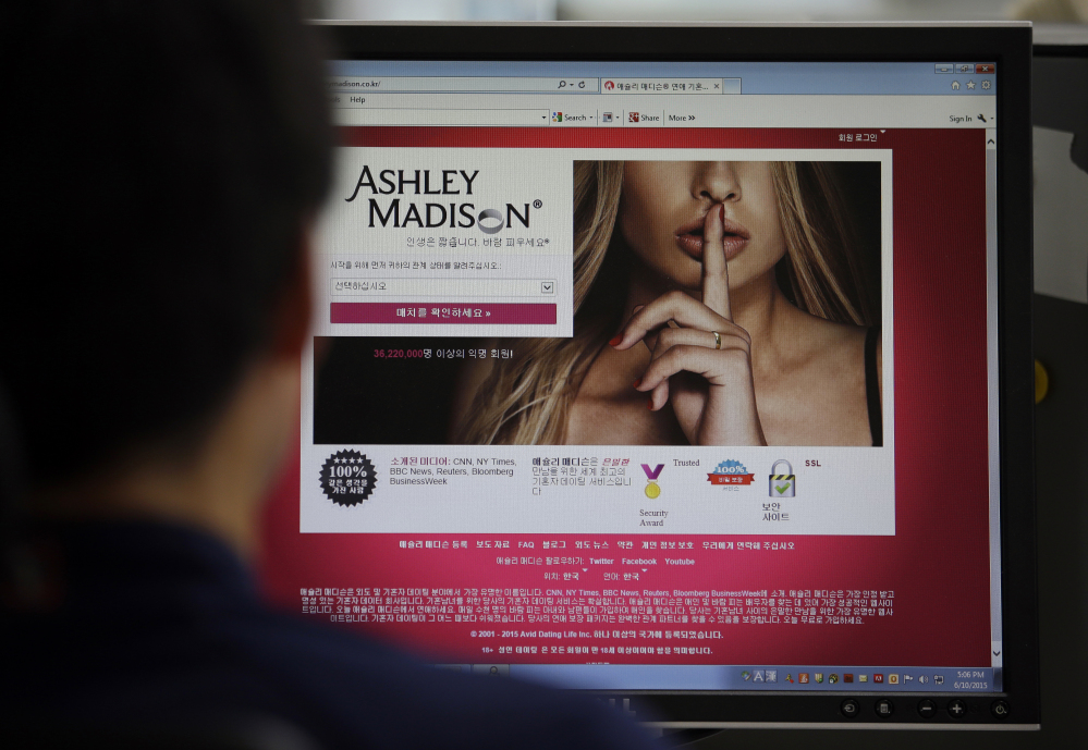 A June 10, 2015 photo from files showing Ashley Madison’s Korean web site on a computer screen in Seoul, South Korea.