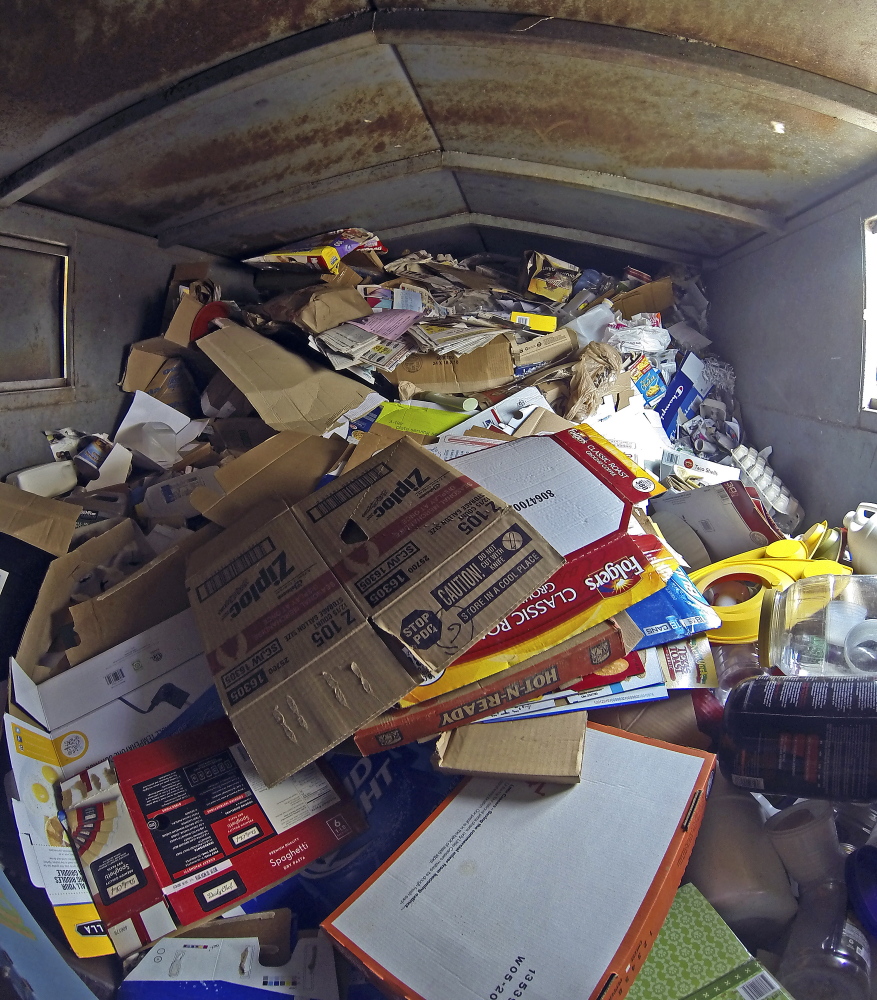The inside of recycling container is seen Tuesday at the John Charest Public Works Facility in Augusta.