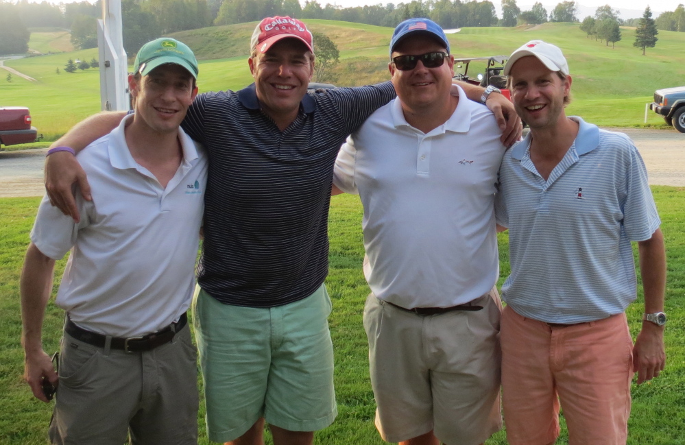 Men’s B Division — First place winners, from left, are Peter Morse, Tripp Carter, David Roerig and Tim Leadbetter.