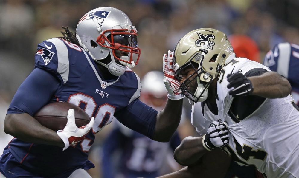 AP photo 
 New England Patriots running back Travaris Cadet is stopped on a carry by New Orleans Saints defensive end Cameron Jordan in the first half of a preseason game in New Orleans on Saturda.
