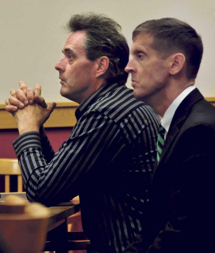 Robert Dale, left, and his attorney Walter McKee are seen during a hearing in Skowhegan District Court on Monday.
