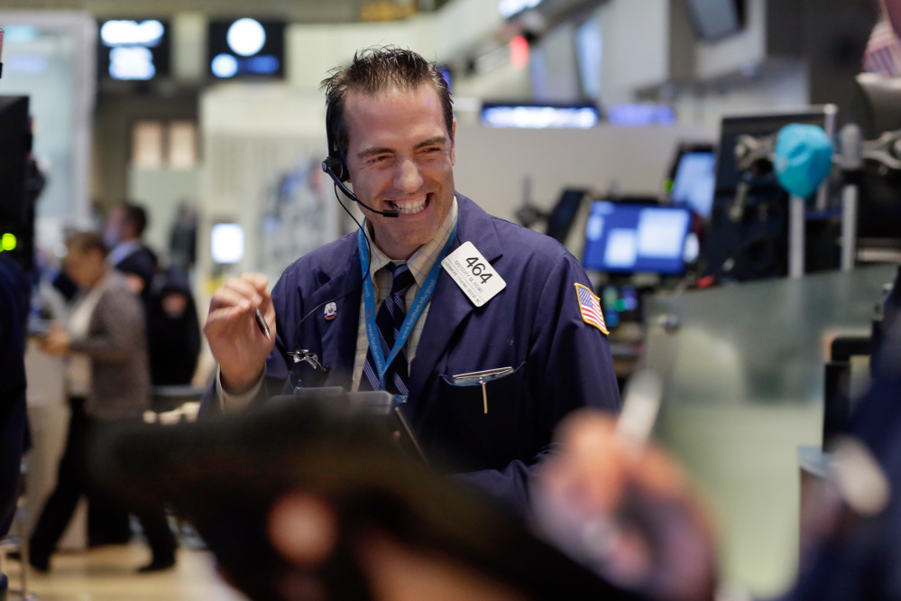 The Associated Press Trader Gregory Rowe works on the floor of the New York Stock Exchange on Wednesday, when U.S. stocks ended a six-day slump and closed sharply higher.