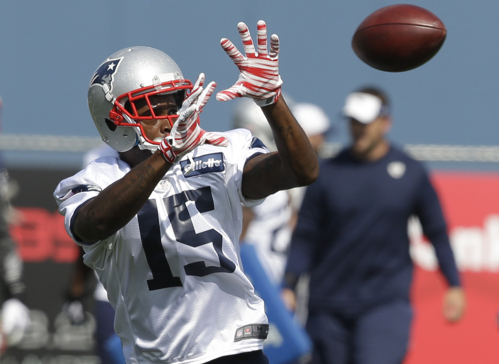 New England Patriots wider receiver Reggie Wayne makes a catch during practice Wednesday in Foxborough, Mass.