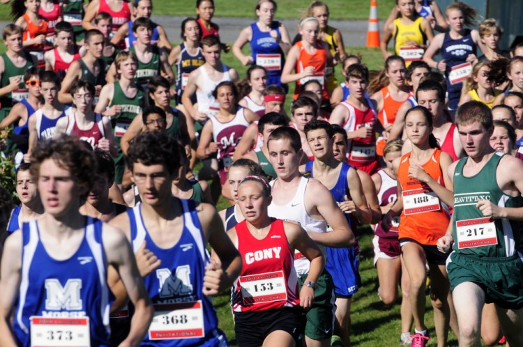 The boys and girls teams run the 2.4-mile course together during the 15th annual Laliberte Invitational last August at Cony High School in Augusta.