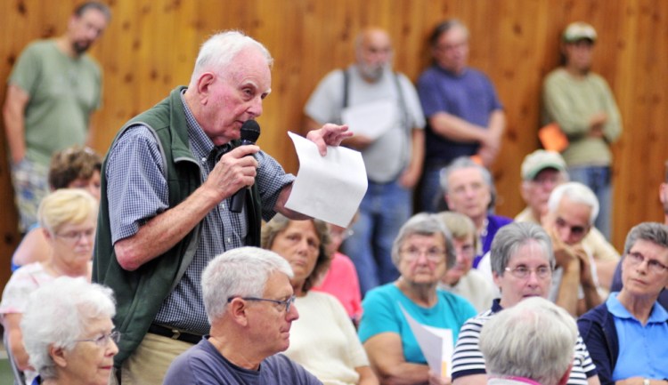 Jack Sutton joins the debate Saturday during a special town meeting about building a Belgrade Town Office. The meeting was held in the Belgrade Community Center for All Seasons.