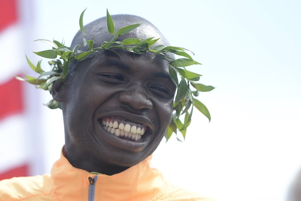 Stephen Kosgei Kibet of Kenya smiles after winning the Beach to Beacon 10K Saturday.