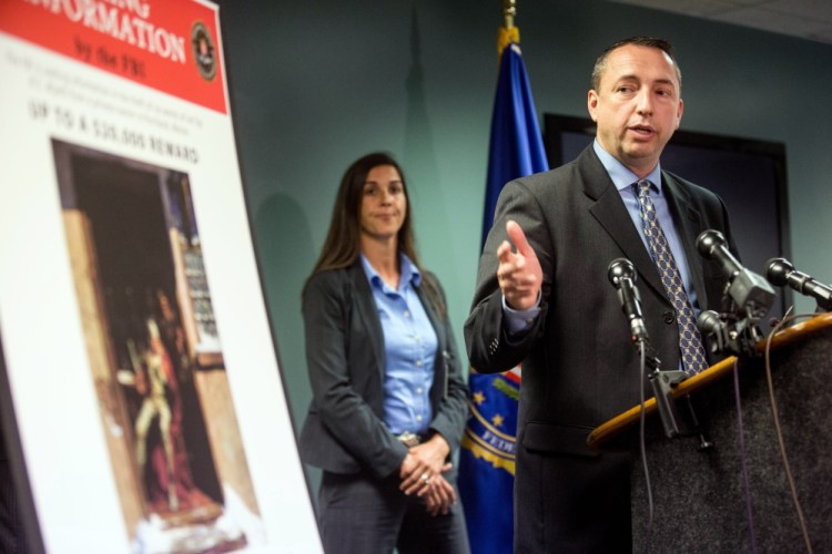 Portland Police Chief Michael Sauschuck said during a news conference at FBI headquarters in Boston on Tuesday that the six N.C. Wyeth paintings stolen in Portland in 2013 were taken from an unoccupied apartment at 18 Monument Square. Two are still missing. At left is Detective Kelly Gorham, who is Portland's lead investigator on the case.