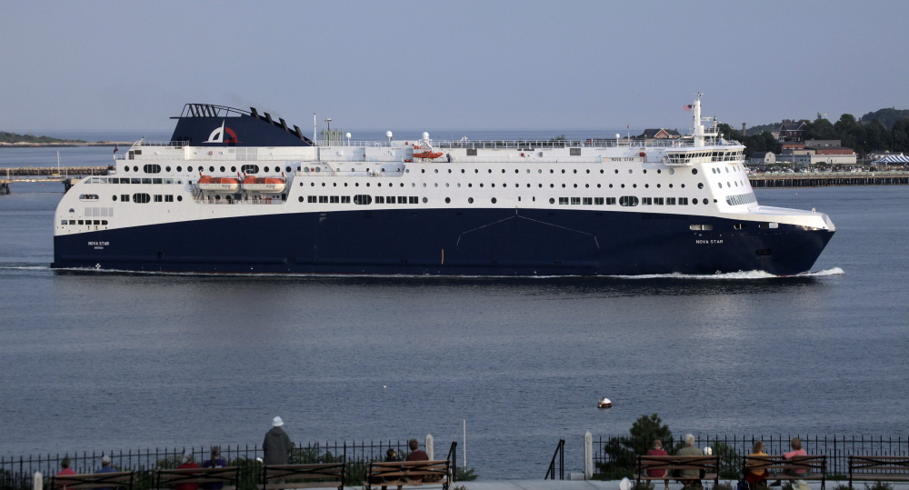 The Nova Star ferry, shown entering Portland Harbor, offers amenities only found on a large ship. Officials in Nova Scotia have the option, however, to go with a cheaper ferry service that is more of a bare-bones transport.