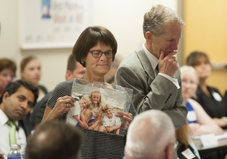 Dr. Lynn Keating of Brunswick, along with her husband, Dr. Thomas Keating, relates how their son died as a result of his opiate addiction, during a roundtable discussion Tuesday in Brewer.