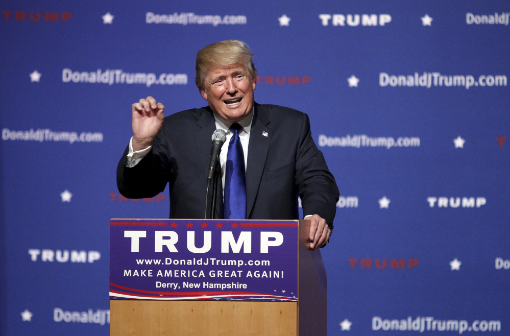 FILE - In this Aug. 19, 2015 file photo, Republican presidential candidate businessman Donald Trump speaks in Derry, N.H. Trump has until Sept. 30 to pledge to rule out a third-party run if he intends to appear on the South Carolina primary ballot. (AP Photo/Mary Schwalm, File)