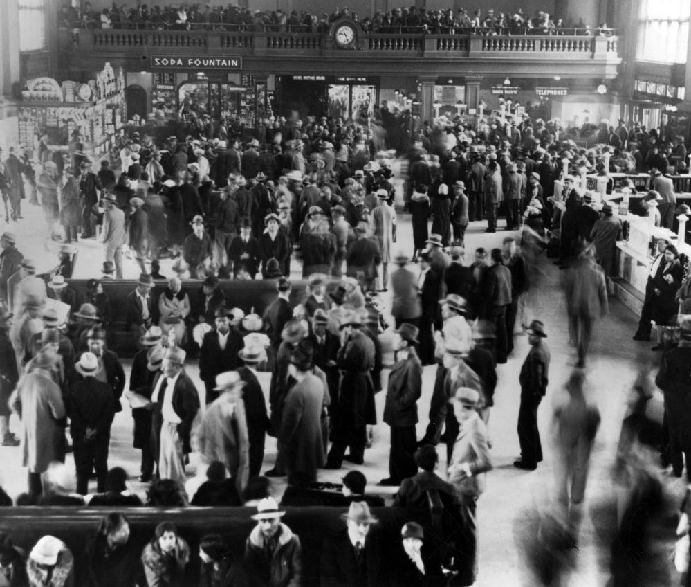This 1932 photo from a collection at the Los Angeles Public Library shows hundreds of Mexican immigrants at a Los Angeles train station awaiting deportation because they were thought to be competing for jobs with whites.