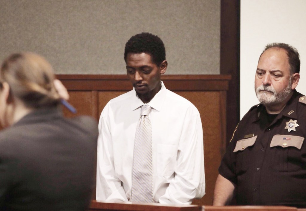 Abil Teshome stands in court on Friday.