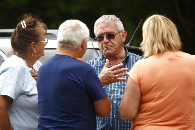 Richard Moreau talks with supporters in Canton, where Maine law officials were searching for his daughter, Kimberly Moreau, who has been missing since 1986.  Carl D. Walsh/Staff Photographer 