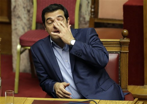 Greece's Prime Minister Alexis Tsipras reacts  during an emergency parliament session in Athens on July 23. The Associated Press