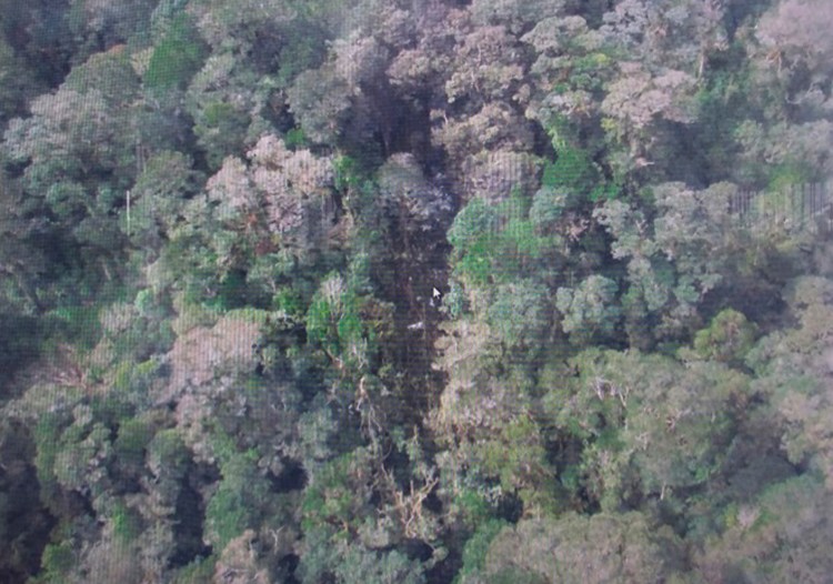 This photo released by the National Search and Rescue Agency (BASARNAS) of Indonesia Monday shows the part of the wreckage that BASARNAS identified as of the missing Trigana Air Service flight that crashed in Oksibil, Papua, Indonesia. The Associated Press/The National Search and Rescue Agency of Indonesia