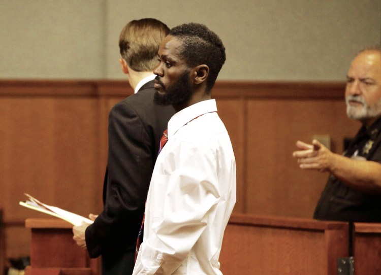 Mohamud Mohamed is one of three men who made initial court appearances at the Cumberland County Courthouse in Portland on Friday on charges of murdering Freddy Akoa of Portland.