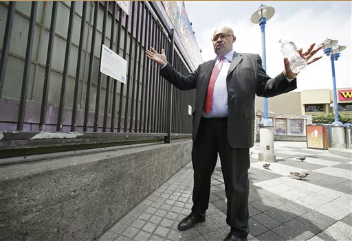 Mohammed Nuru, director of San Francisco Public Works, talks about the city's latest effort to clean up urine-soaked walls outside a Mission District transit station. The Associated Press