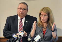 AUGUSTA, ME - MAY. 12: Gov. Paul LePage, left, and Commissioner of the Department of Health and Human Services Mary  Mayhew speaks during news conference about a bill to end the "welfare cliff" on Tuesday May 12, 2015 at the State House's Cabinet Room in Augusta. (Photo by Joe Phelan/Staff Photographer)