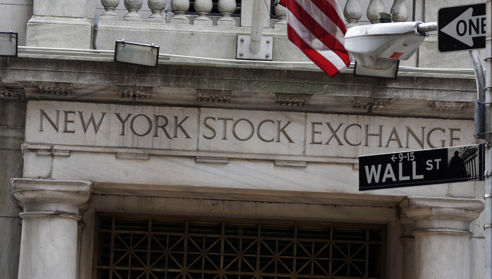 This Oct. 2, 2014, file photo, shows the Wall Street entrance of the New York Stock Exchange.