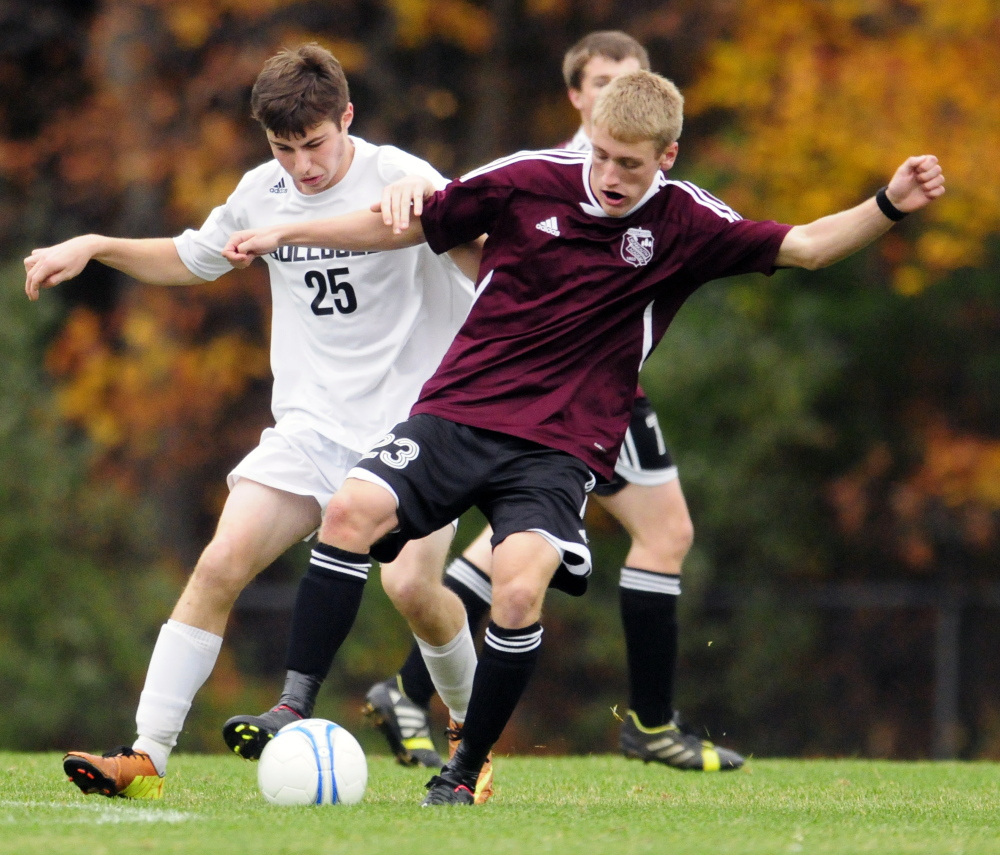 Staff file photo by Joe Phelan 
 Hall-Dale's Nate Mills, left, and Monmouth Academy's Hunter Richardson battle for possession during a game last Octoberin Farmingdale. The Bulldogs and Mustangs return strong teams and should be in the Mountain Valley Conference hunt.