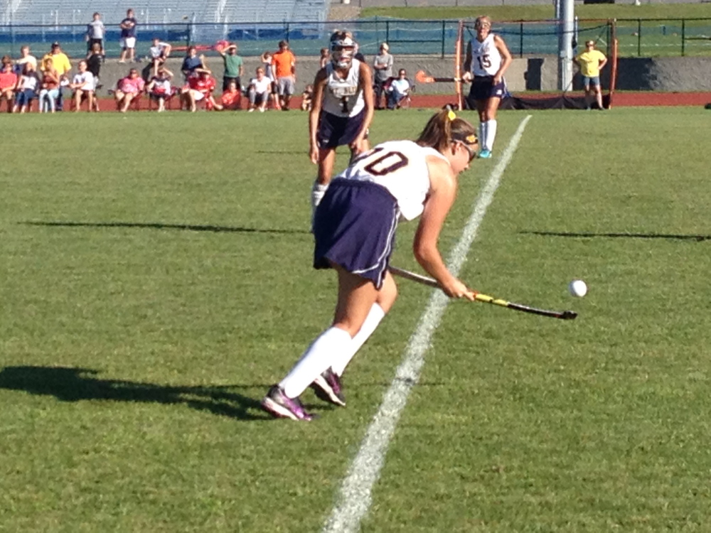 Staff photo by Evan Crawley 
 Mt. Blue's Ellie Pelletier tries to gain control of the ball during a Class A North field hockey game against Cony on Friday in Farmington.