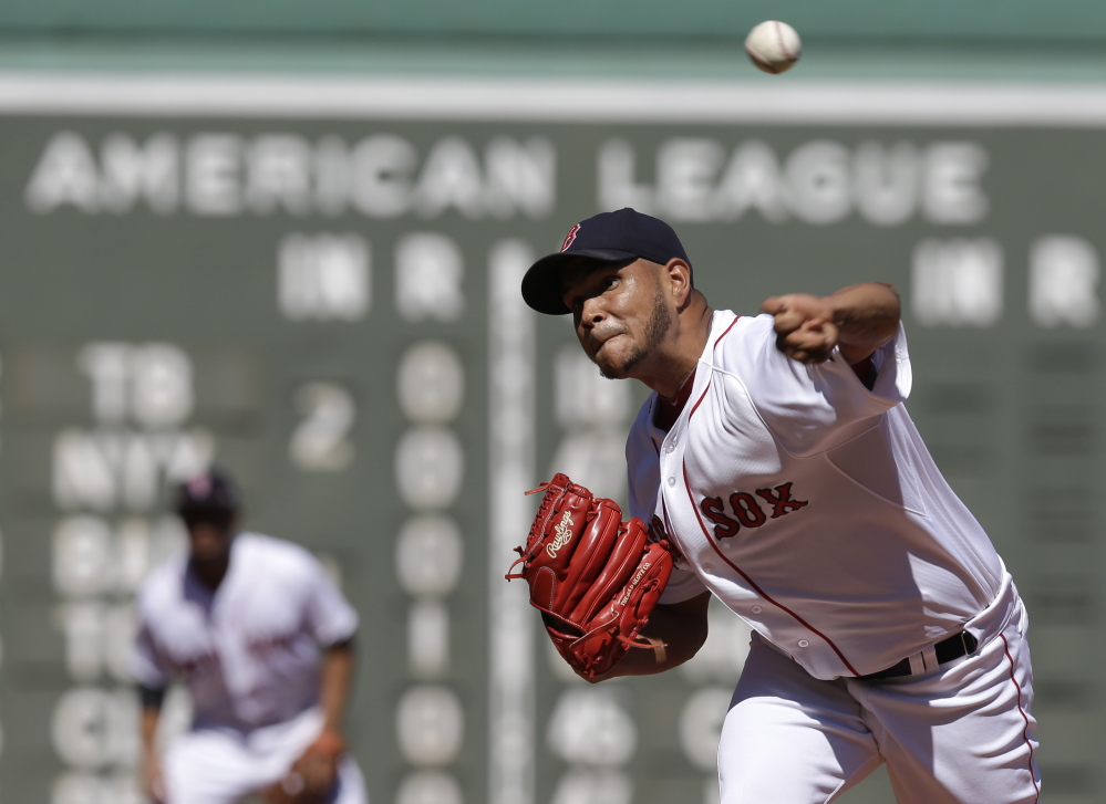 Boston Red Sox starter Eduardo Rodriguez delivers a pitch against the Philadelphia Phillies in the first inning Sunday at Fenway Park in Boston. Rodriguez allowed eight hits while striking out seven.