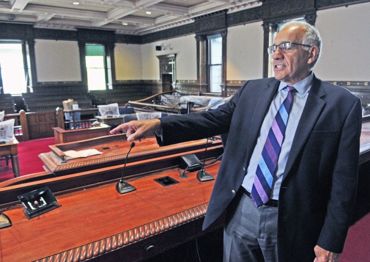 Supreme Court Justice Joseph Jabar talks about additions to the bench during a tour Thursday of the recently renovated old courtroom in the Kennebec County Courthouse in Augusta. The judges’ bench has been enlarged so the seven members of the Maine Supreme Judicial Court can hear cases there.