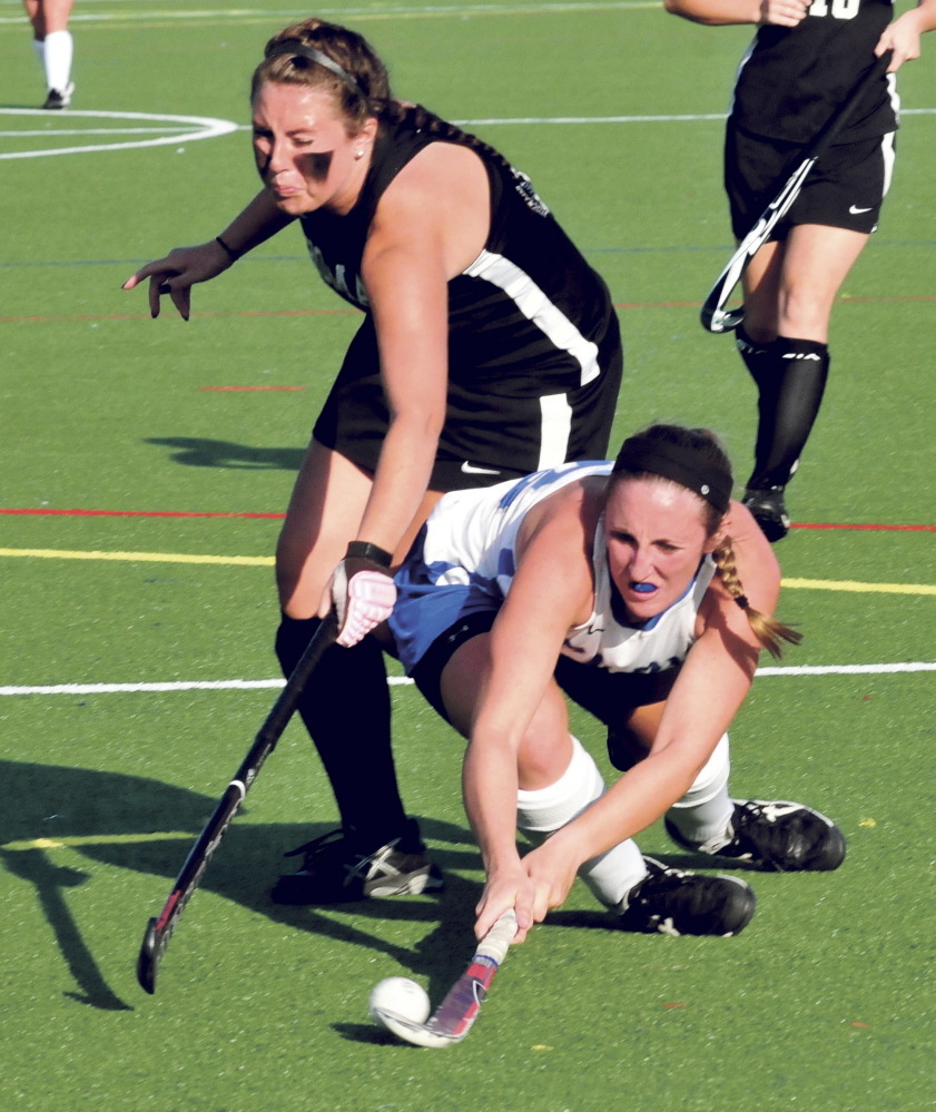 Staff photo by David Leaming 
 Thomas' Erica Blake, left, and Colby's Megan Fortier go after the ball during a non-conference game Wednesday at Thomas.