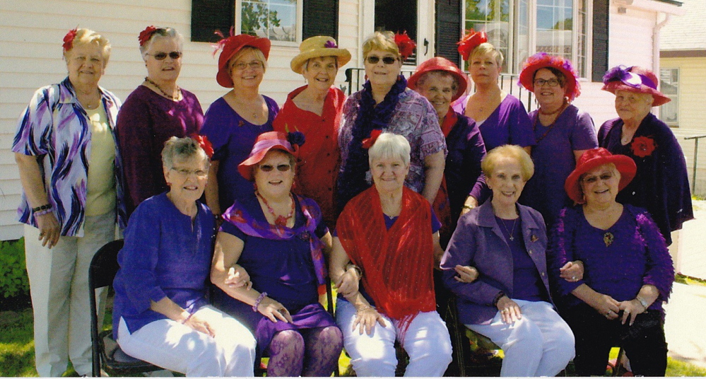 Augusta Red Hattergroup, Ruby Gems, recently enjoyed an afternoon tea at the home of member Julie Brawn. Brawn, Kitty White and Jeanne Fortin hosted the event. The group met outside on Julie’s patio, each guest was gifted with a cup and saucer chosen especially for them and were asked to share how they thought the cup related to them and their personality. The group tries to meet twice a month. Once for a planning meeting, an “innie” and again to dress up in Red Hat Regalia and go out on the town an “outie”. At each meeting the goal is to have fun and enjoy each other’s company. In front, from left, is Brawn, Pauline Lambert, Giselle Morin, Joan Breton and Terry Cloutier. In back, from left, is Joan Theberge, Fortin, White, Elaine Carpentier, Anne Sawyer, Beverly Phillips, Carol Porter, Pat Pouliotte and Lorraine Noel.