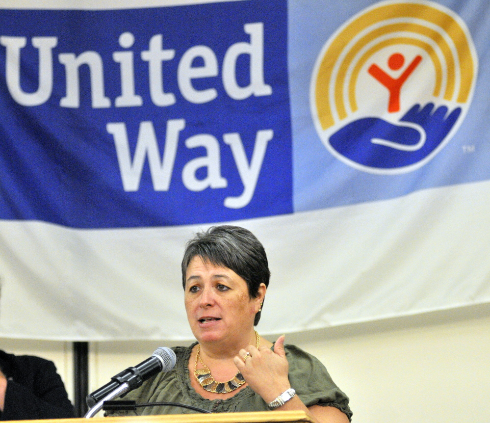 Deborah Boothby talks about surviving a fire that destroyed the Augusta apartment building her family lived in at 36 Northern Ave. last December during a salute to Augusta and Gardiner police and fire departments at the United Way of Kennebec Valley kickoff breakfast on Thursday at the Augusta Civic Center.
