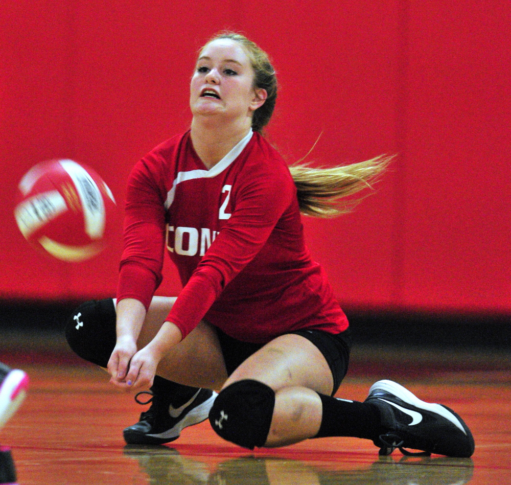 Staff photo by Joe Phelan
Cony’s Hailey Greene digs out a ball against Gorham on Thursday at Cony High School in Augusta.