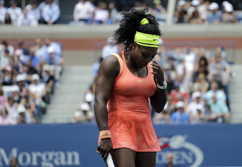 AP photo
Serena Williams reacts after losing a point to Roberta Vinci during a U.S. Open semifinal match Friday in New York.