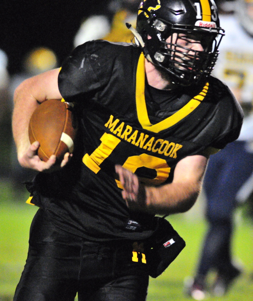 Maranacook quarterback Kyle Morand runs for a touchdown during the second quarter of a game against Boothbay on Friday night at Ricky Gibson Field of Dreams in Readfield.