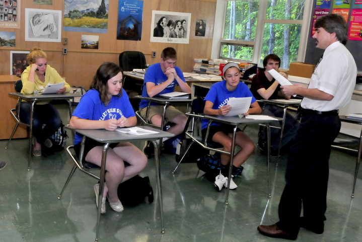 Upper Kennebec Valley Memorial High School teacher John Berube teaches at the Bingham school on Wednesday. The school was ranked 175th out of 500 by Newsweek for its efforts to send low-income students to college.
