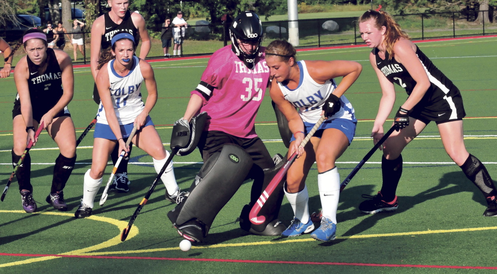 Thomas College goalie Abbie Charrier makes a save during a recent game against Colby College.