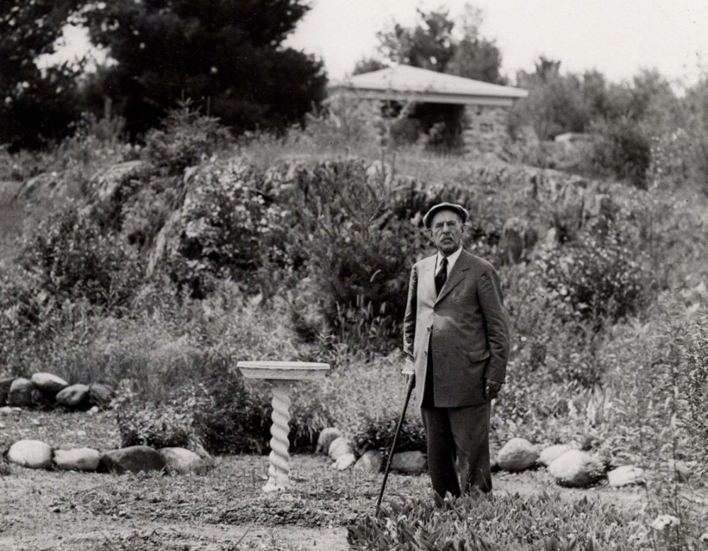 L.C. Bates Museum contributed photo
George W. Hinckley, founder of Good Will-Hinckley, poses next to the bird sanctuary and gardens that are part of the trail system at the L.C. Bates Museum on the Good Will-Hinckley campus on U.S. Route 201. To celebrate the 100th anniversary of the Dartmouth Trail, museum officials are hoping at least 100 hikers walk the trails Saturday.