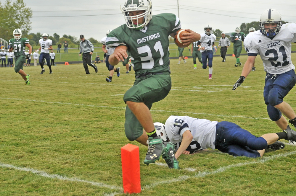 Staff file photo by Michael G. Seamans 
 Mount View running back Tyler Ripley scores a touchdown duringa game against Stearns last Sept. 20 in Thorndike. Ripley and the Mustangs will have their hands full when front-running MCI comes to town.