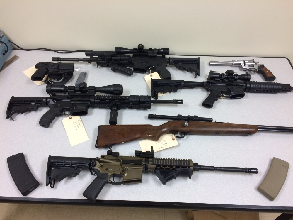 Firearms seized by the Somerset County Sheriff’s Office that authorities say were being illegally possessed by Michael Kelly of Embden.