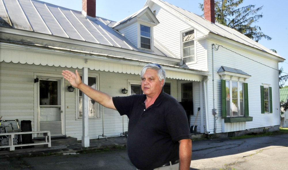 Trinity Evangelical Free Church Pastor Richard Berry speaks on Thursday about the recently acquired property in Skowhegan that will be renovated for offices and a family homeless shelter.