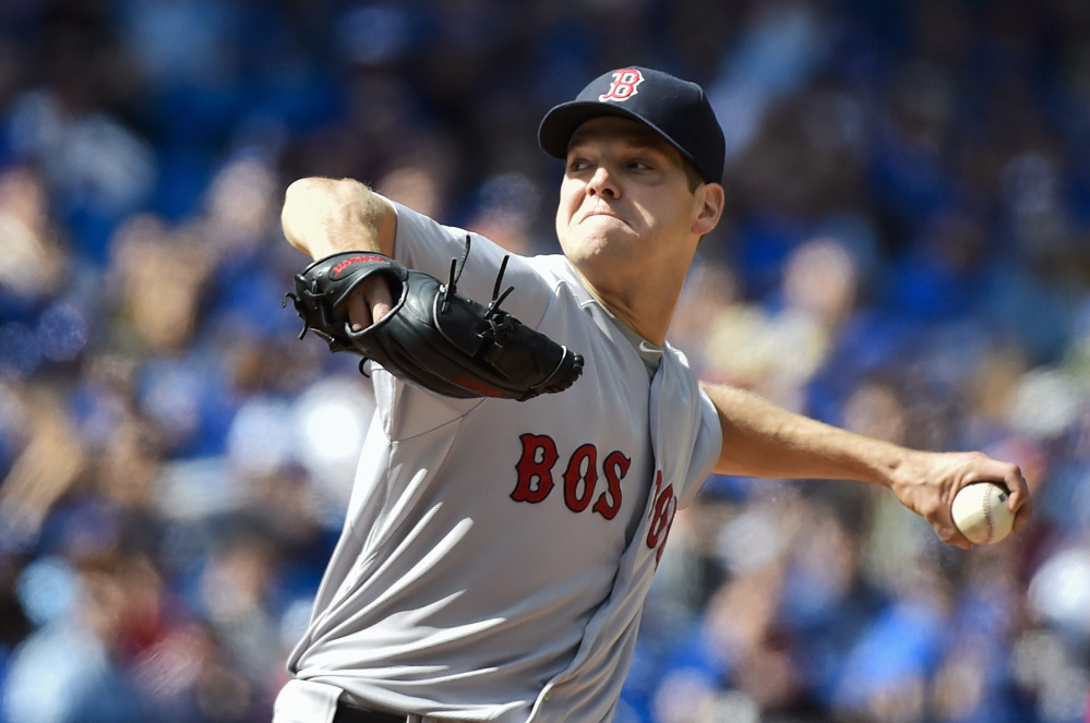 Red Sox’ starting pitcher Rich Hill struck out 10 batters in Boston’s 4-3 win over Toronto on Sunday to earn his first win sinc July 14, 2013.